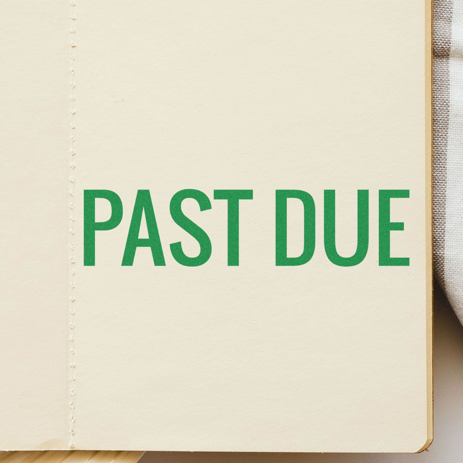 Past due label on book page with green bold PAST DUE text, marking an overdue payment or balance reminder.