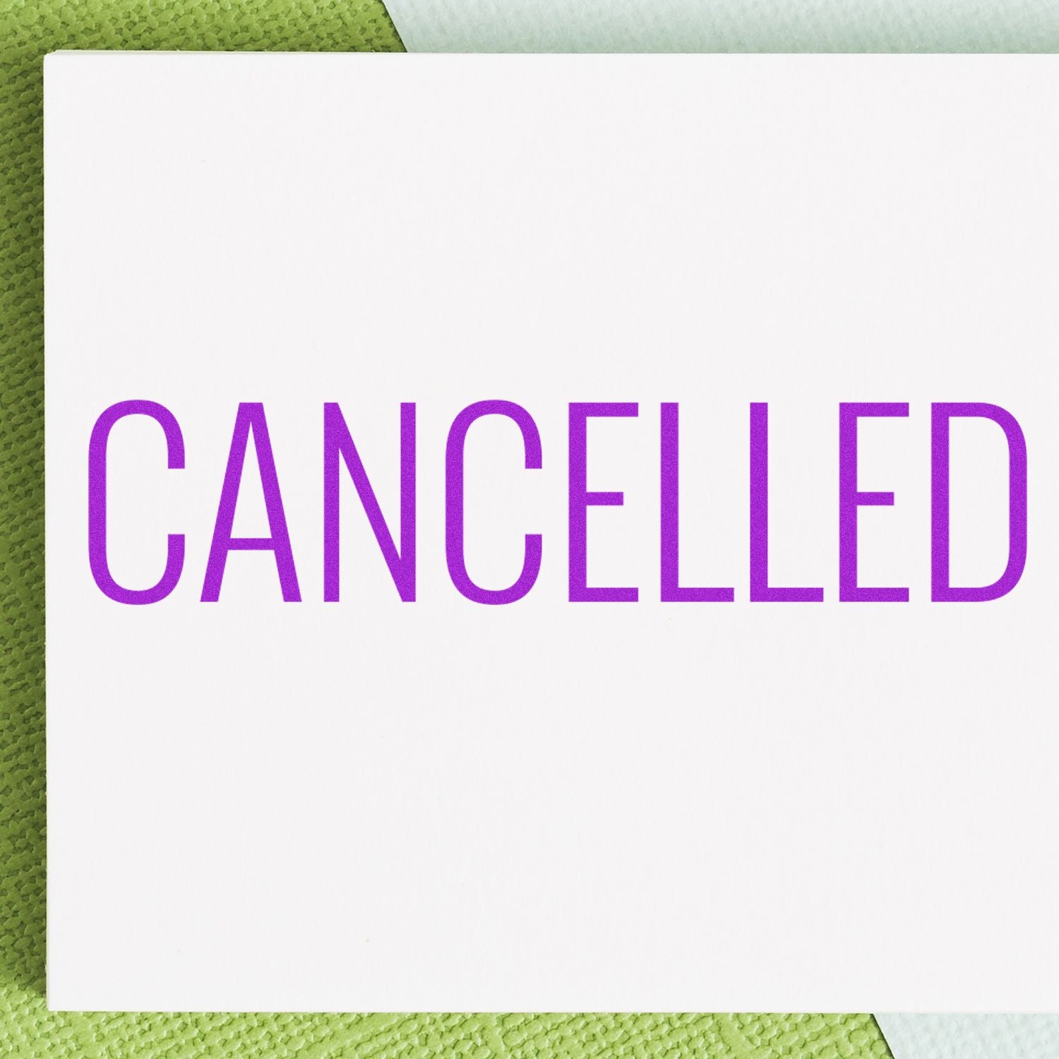Purple CANCELED text on white paper, symbolizing cancellation notice or event canceled announcement.