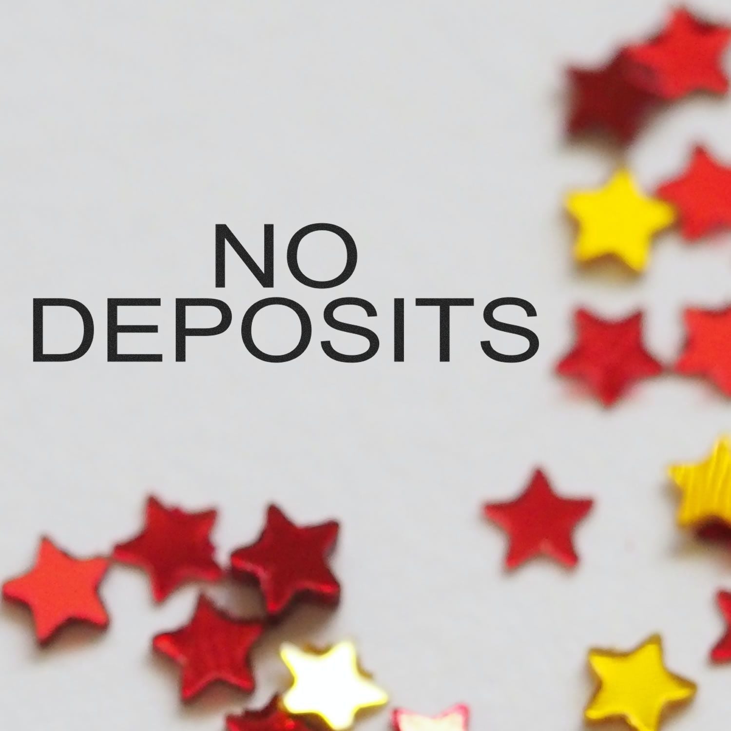 No Deposits promotion with colorful stars background, highlighting a free no-deposit offer for customers.