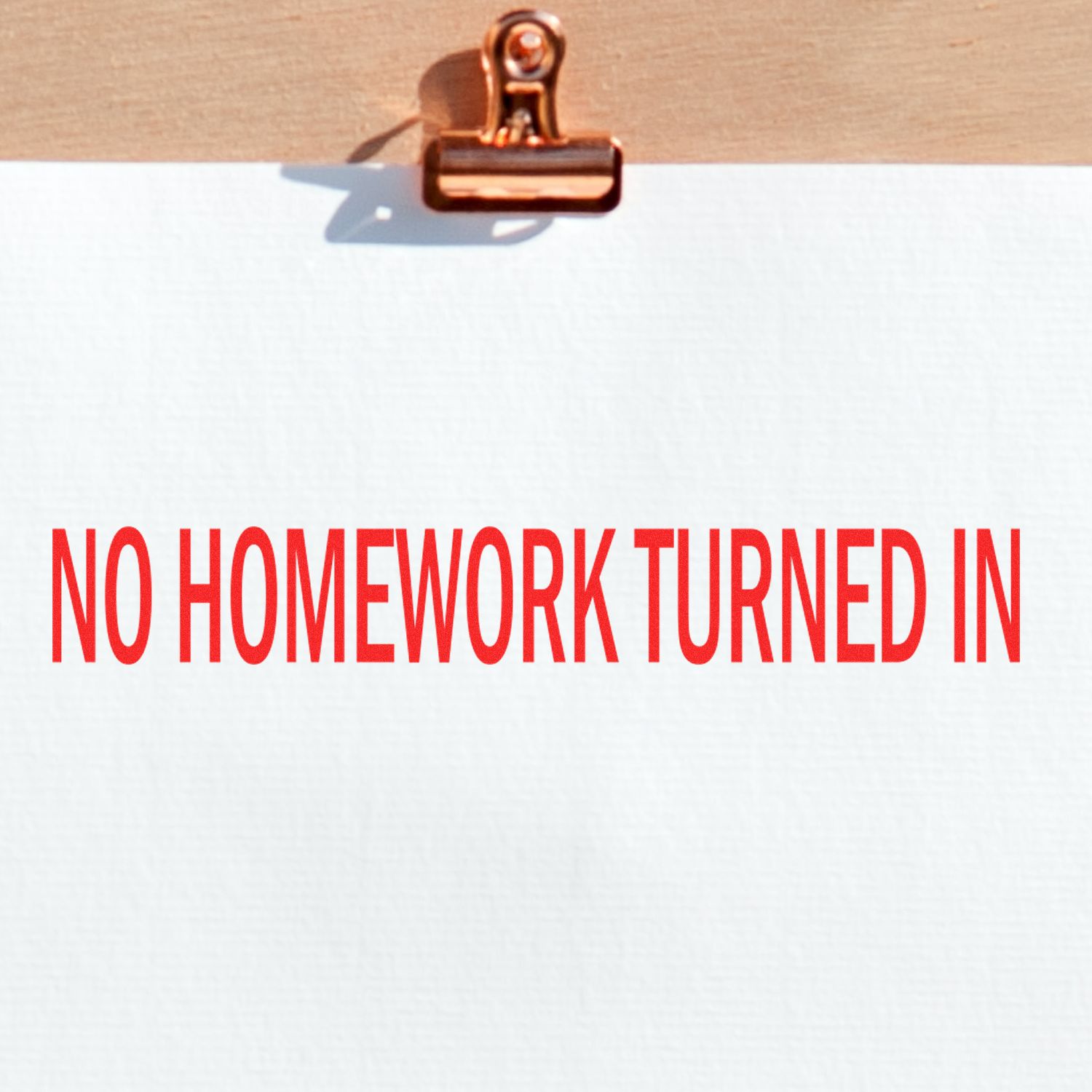 Teacher grading stamp reading No Homework Turned In, classroom notice for missing homework assignments and school deadlines.