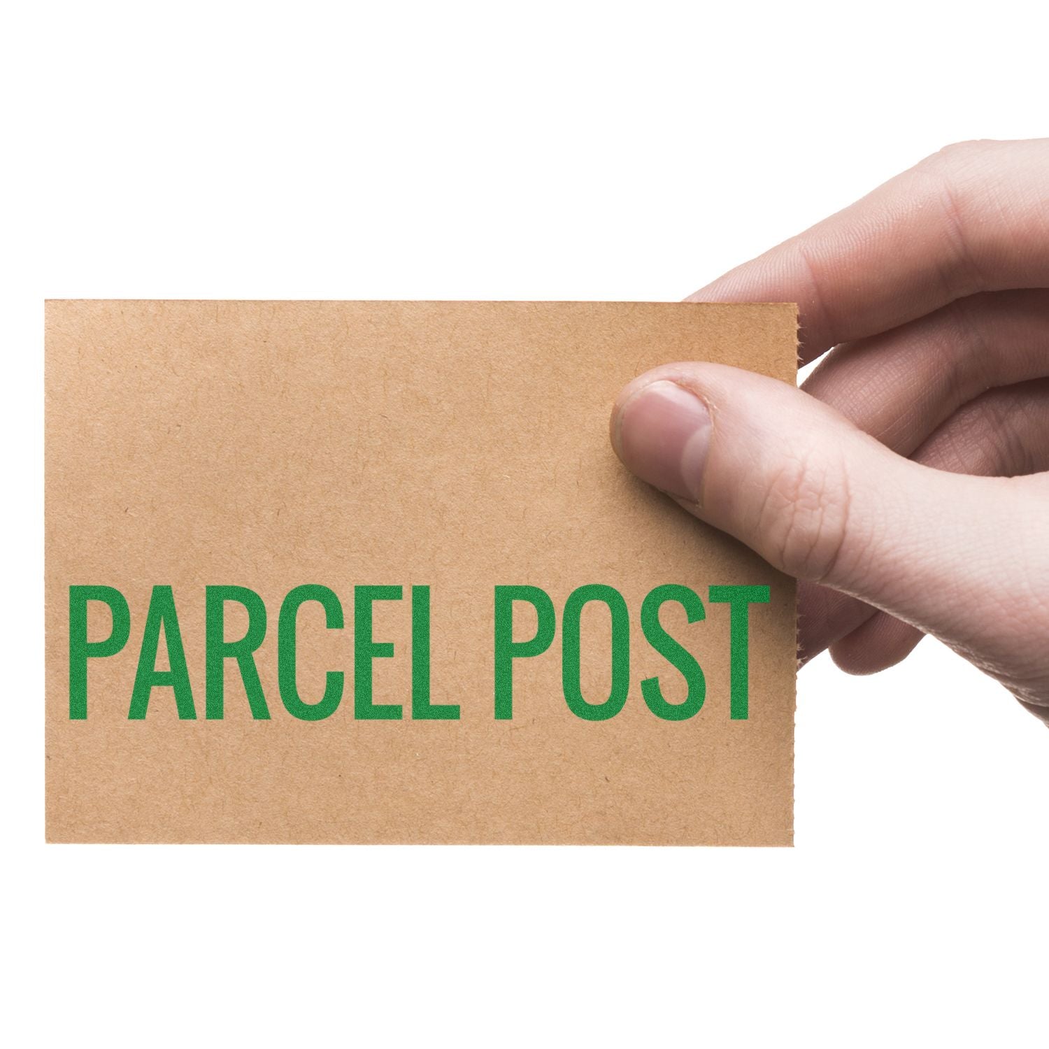 Hand holding a kraft paper parcel post card with green text, isolated on a white background.