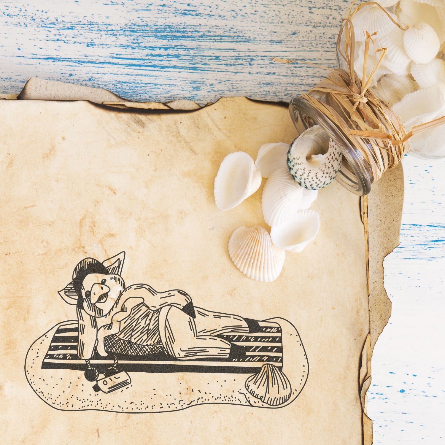 Vintage beach decor with seashells, rustic glass jar, and aged nautical paper background.