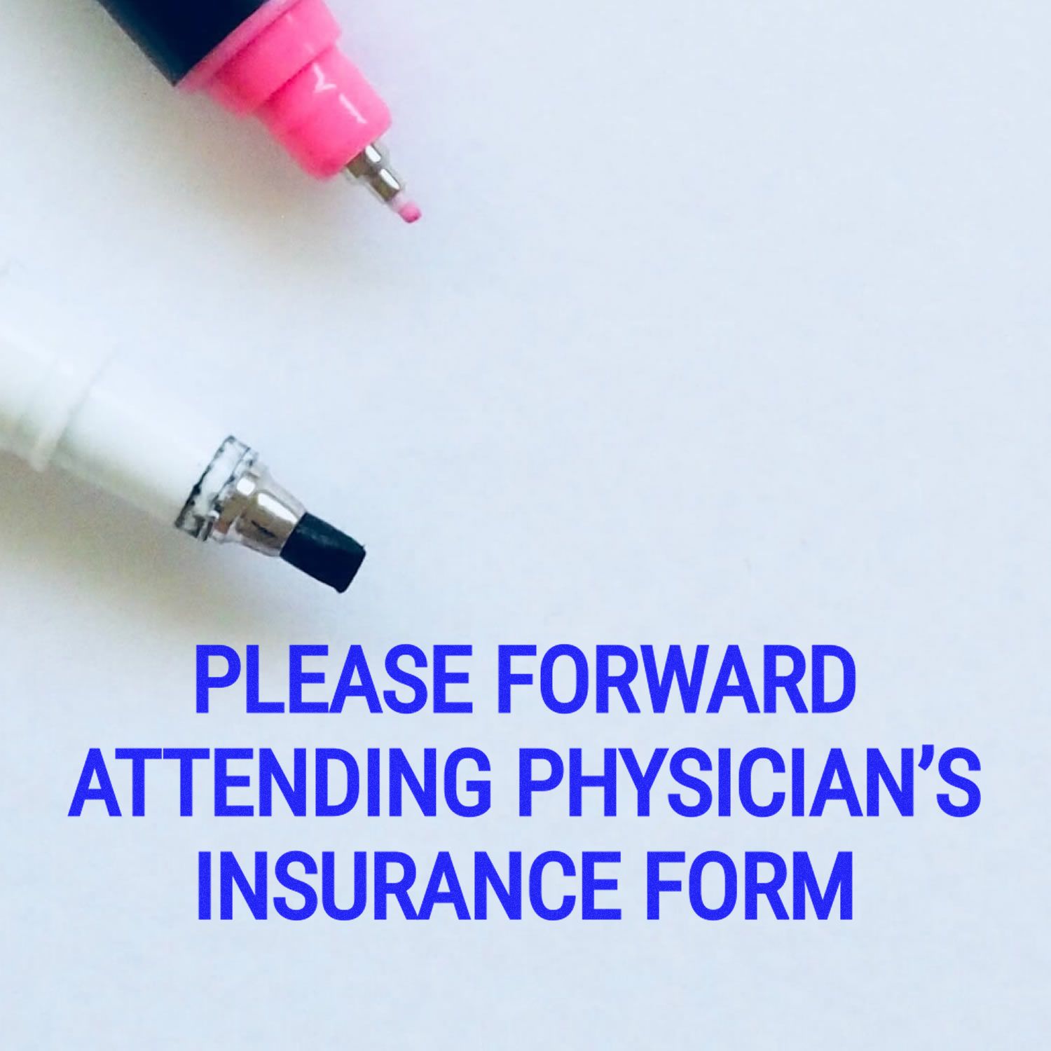 Close-up of two pens on a white background with text reading Please Forward Attending Physicians Insurance Form