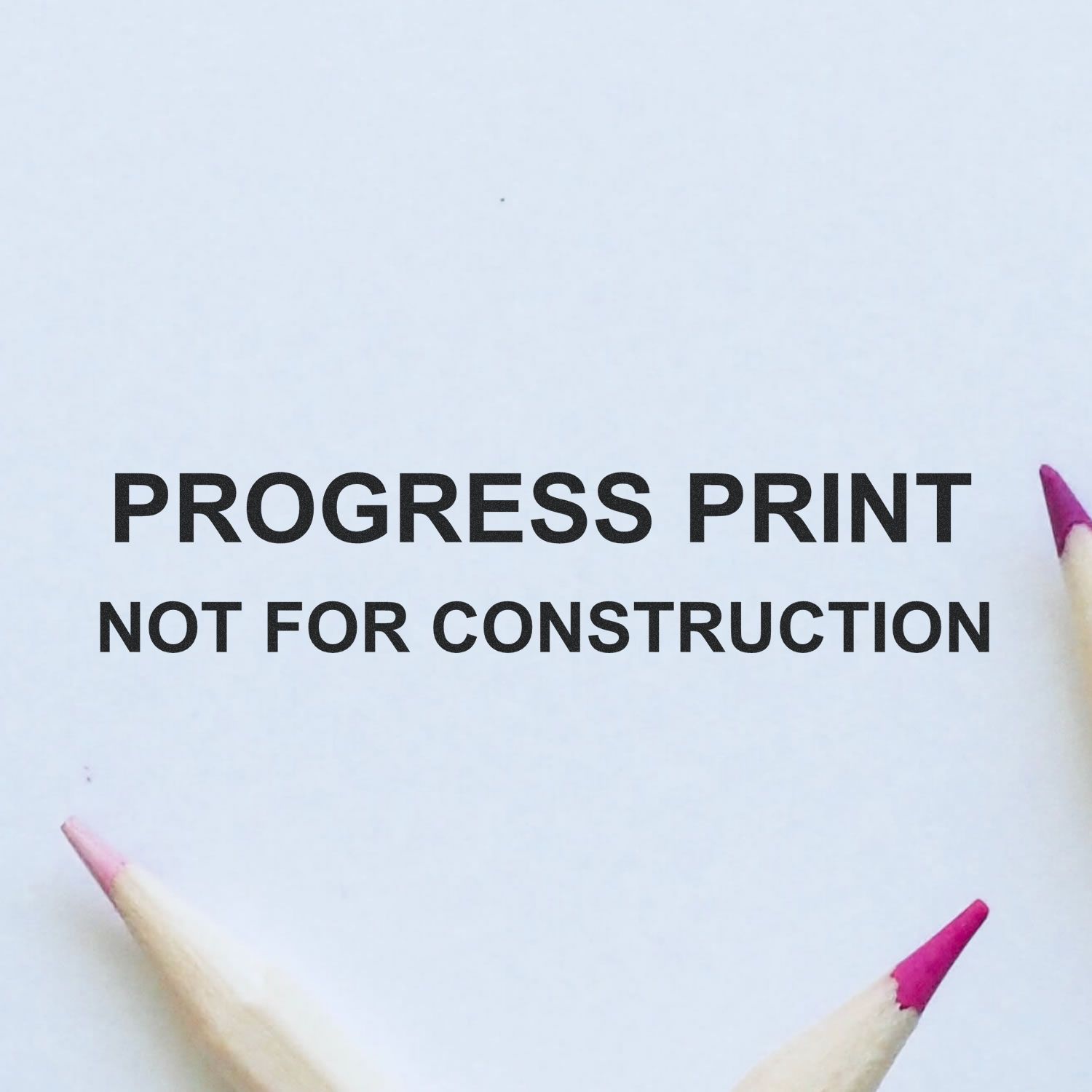 Progress print not for construction text on white paper with pencil tips, architectural blueprint draft concept.