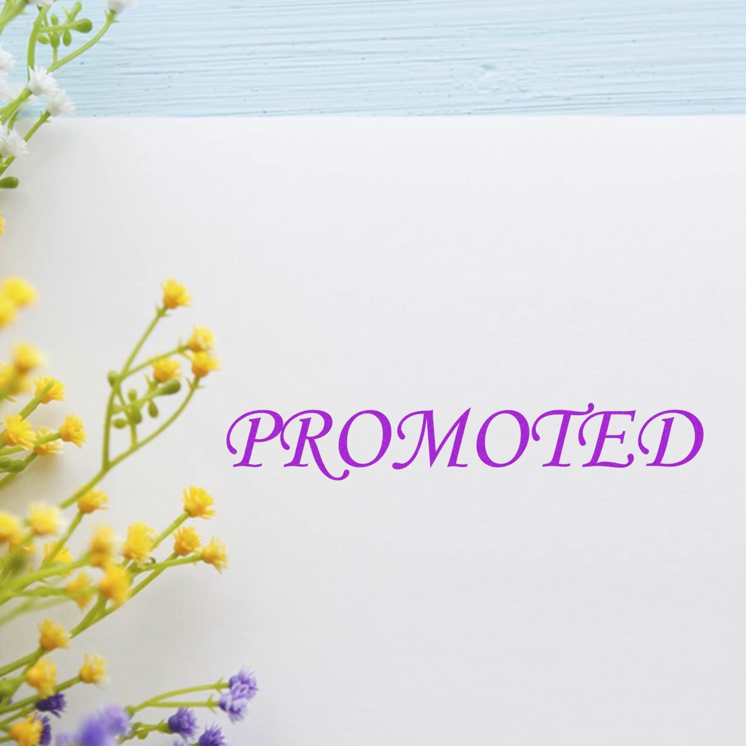 Promoted banner with purple PROMOTED text and fresh yellow and purple flowers on a clean white background