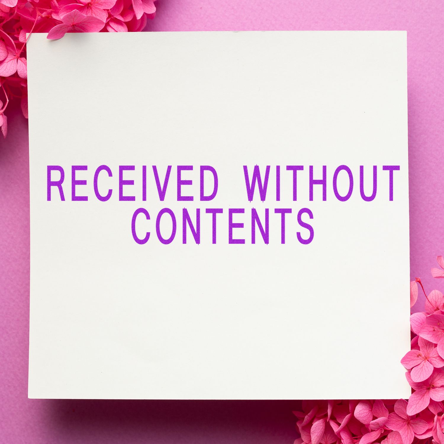 White gift box labeled Received Without Contents on a pink floral background, minimalist empty package mockup.