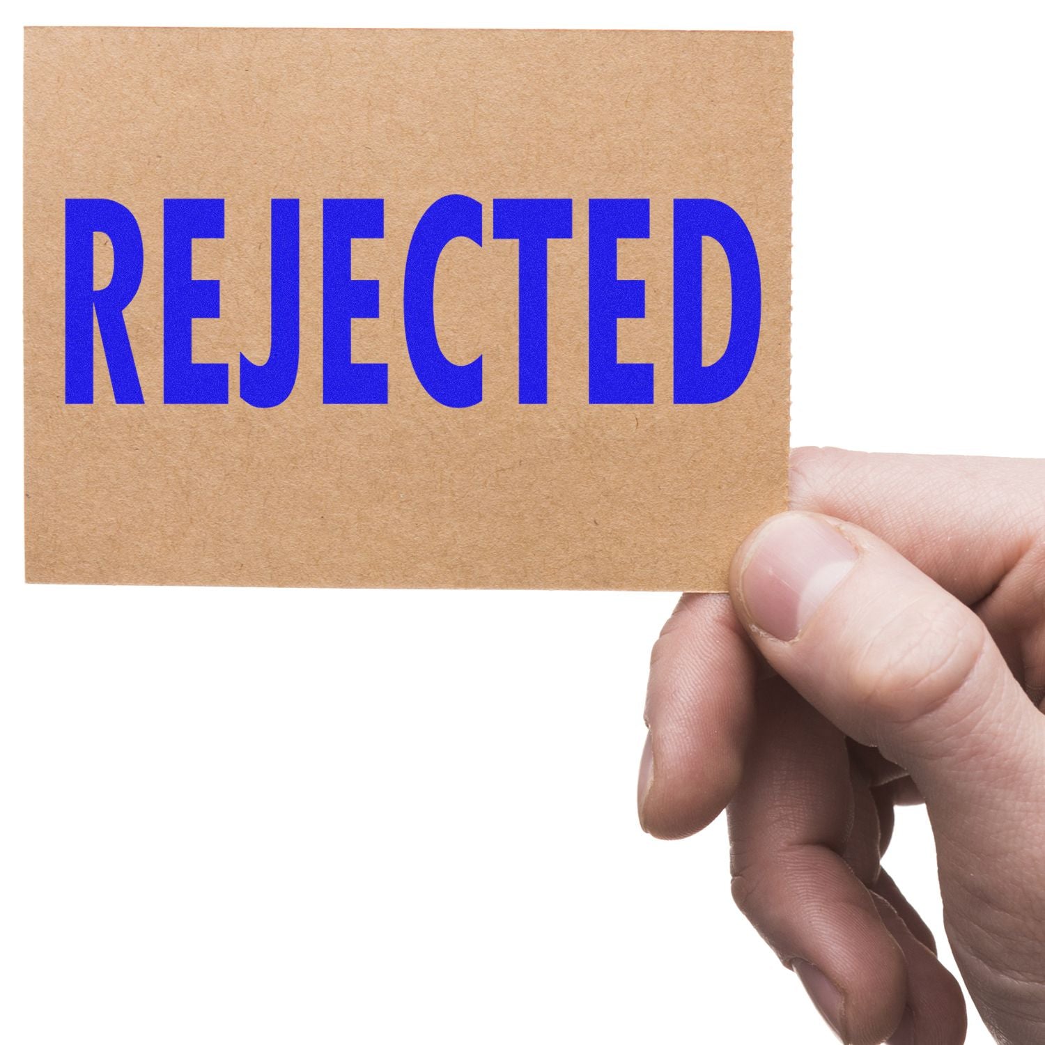 Hand holding cardboard sign with bold blue REJECTED text, concept of denial, refusal, or job application rejection.