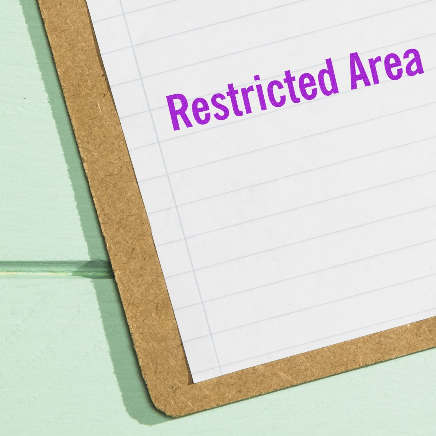 Restricted Area warning on a notebook page, indicating restricted access and safety boundaries.