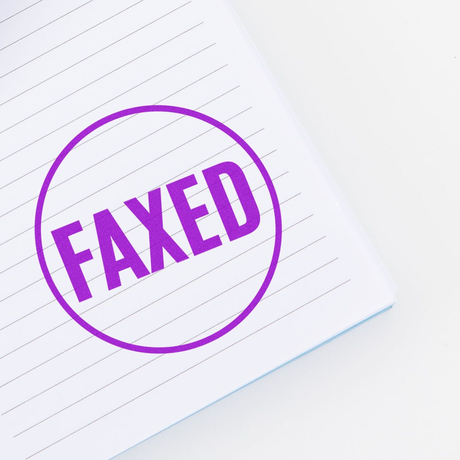 Purple faxed stamp on lined notebook paper, business document approval icon.
