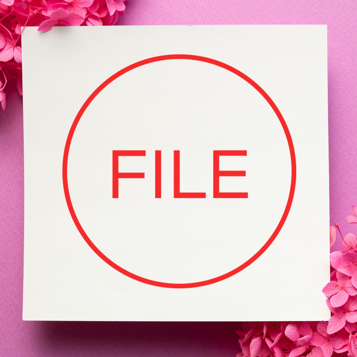 Red file icon on a white card with pink floral background, minimal digital document symbol concept.