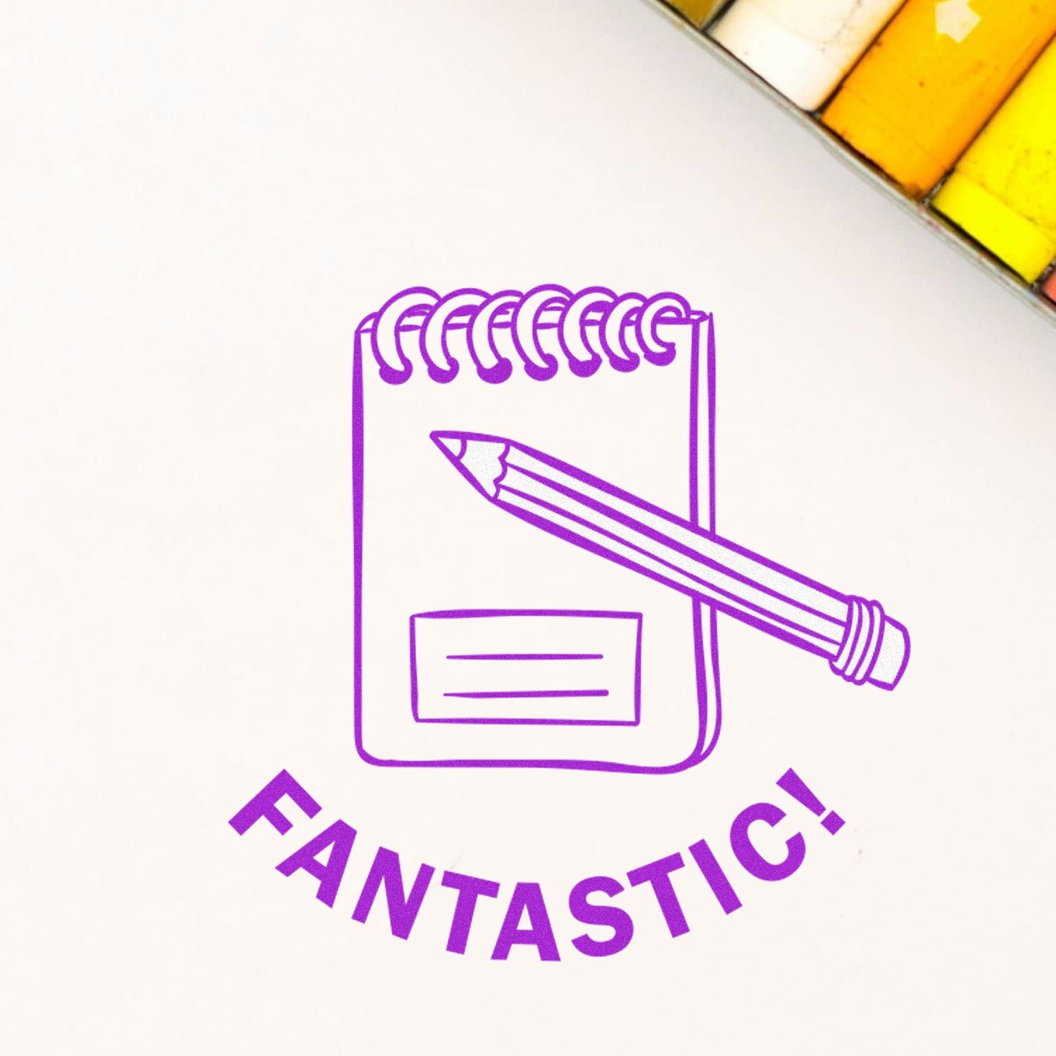 Purple FANTASTIC! notebook and pencil icon on a white background, creative stationery design.