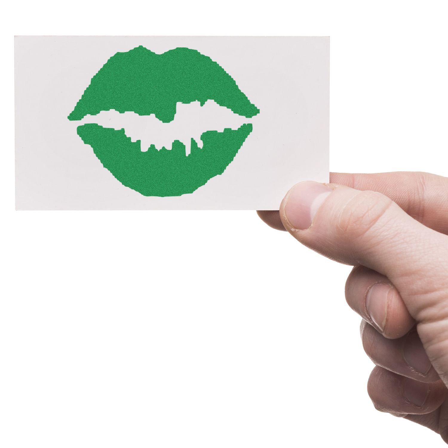 Hand holding white card with green lips logo on a white background