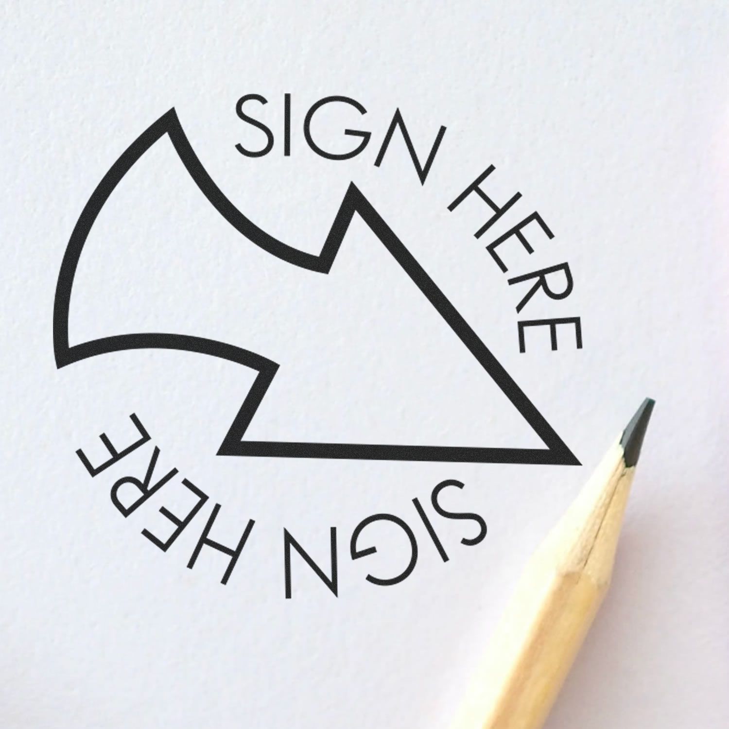 Sign Here logo design with a pencil tip and geometric outline on white paper.
