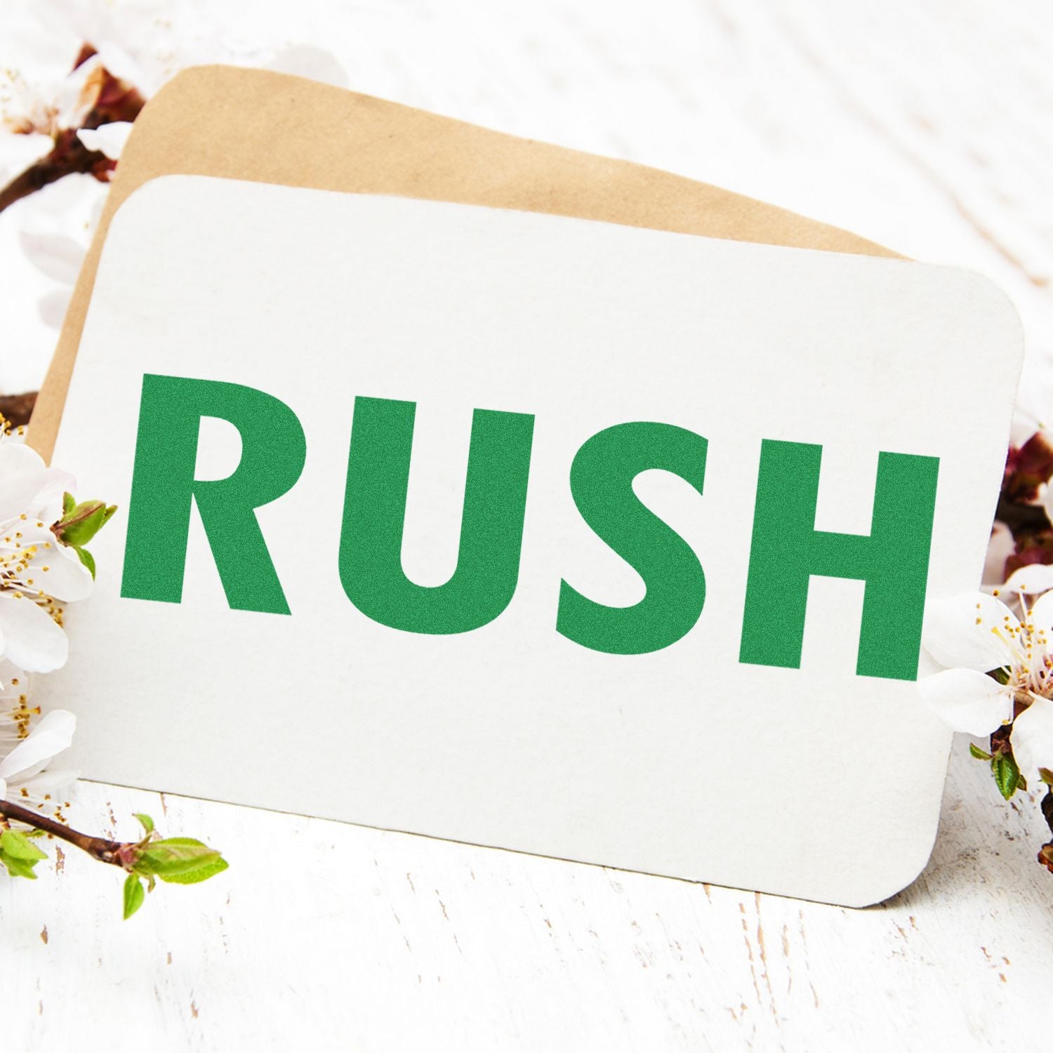 Green RUSH text on white card with spring blossoms, minimalist floral design background