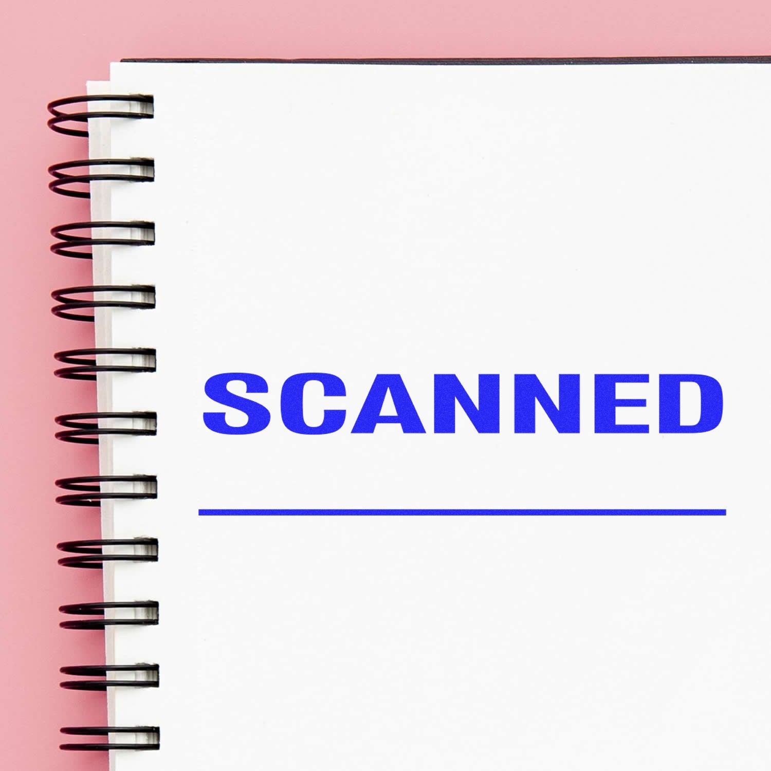 Notebook page shows SCANNED text, symbolizing document scanning and digitization for searchable records.