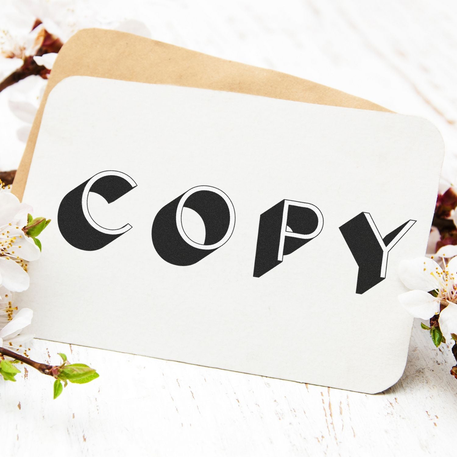 COPY text on a kraft paper envelope with white blossoms, representing printing and copy services branding.