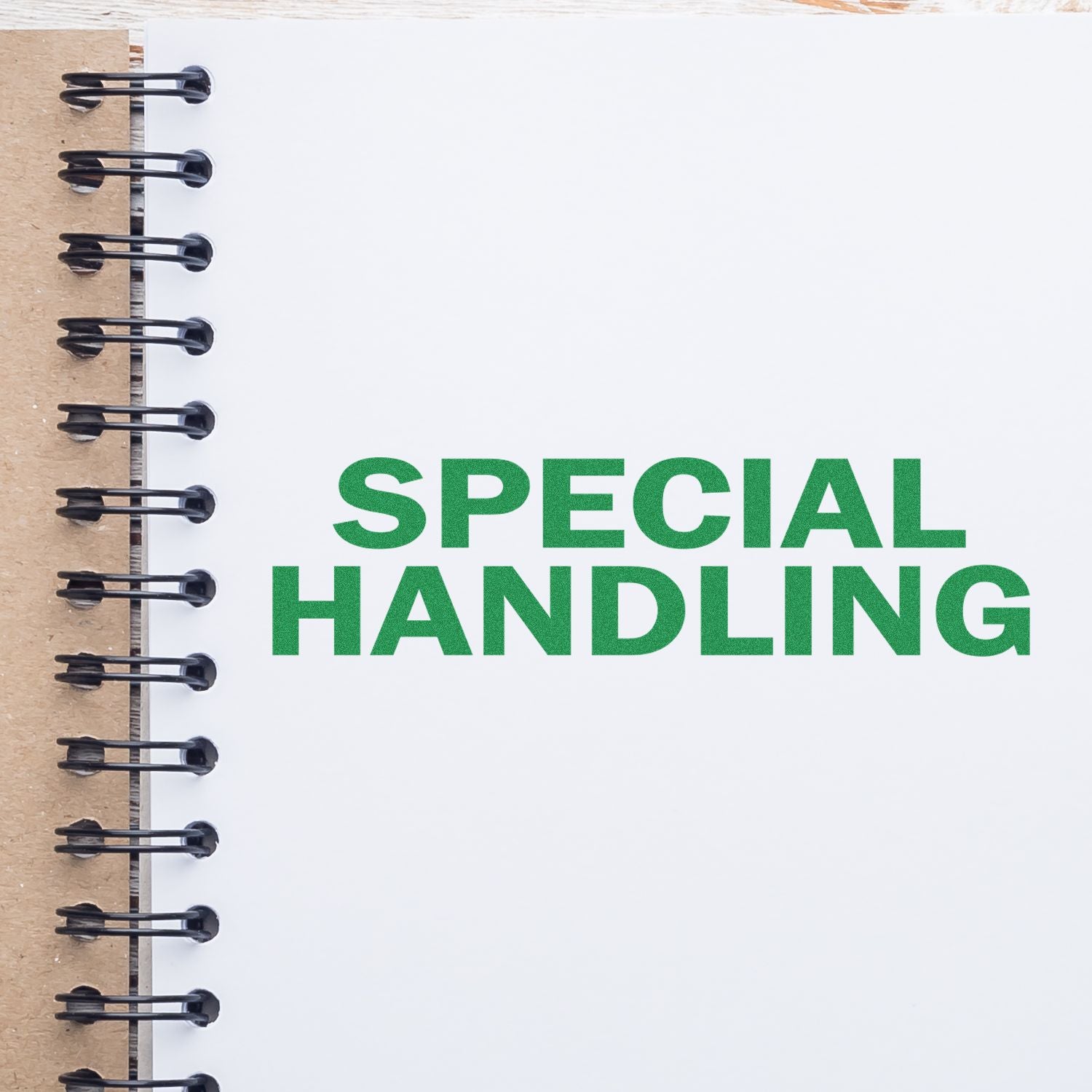 Notebook page with green Special Handling text, representing special handling instructions, shipping, and product care.