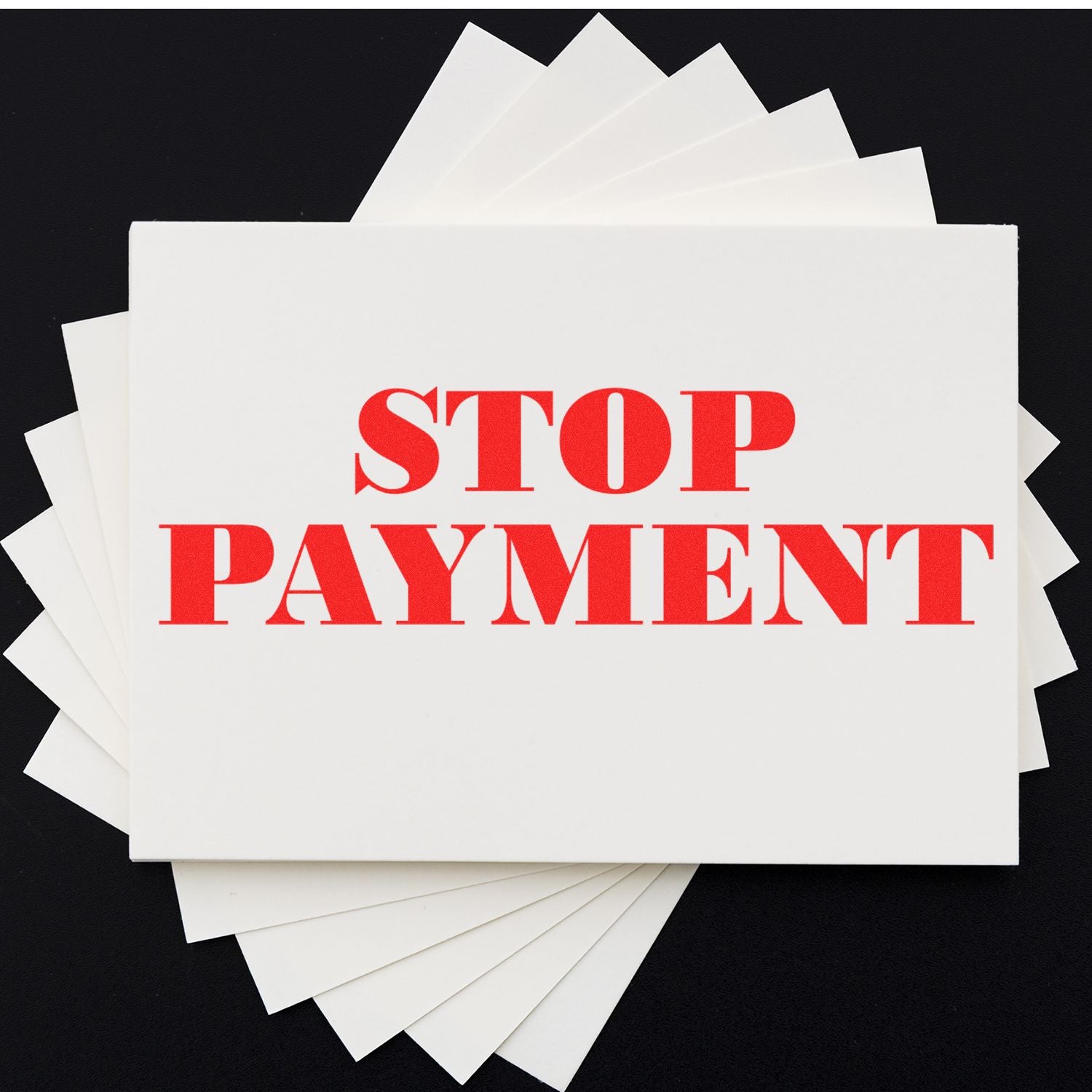 Stack of white envelopes with bold red STOP PAYMENT text, symbolizing payment cancellation or financial notice.