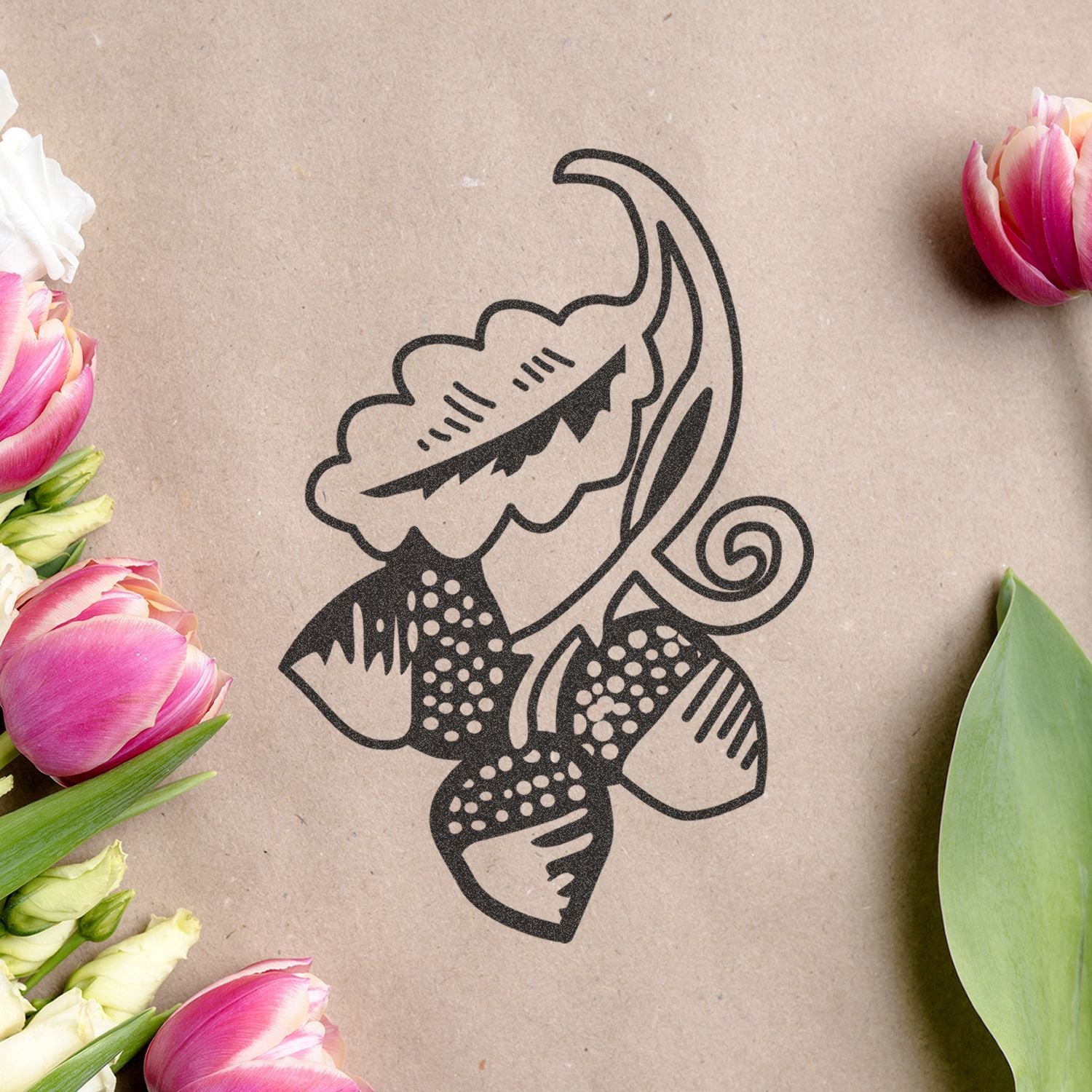 Black floral line art design on kraft paper, surrounded by pink and white tulips and green leaves, elegant botanical background.