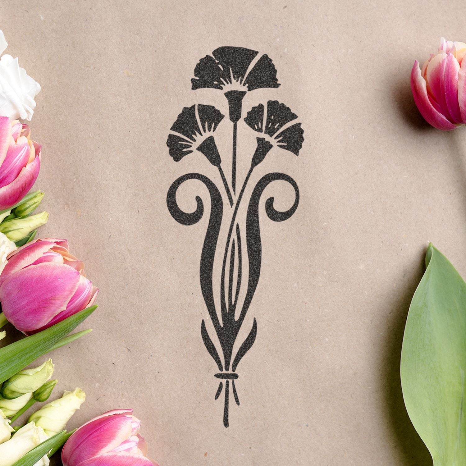 Elegant black floral logo on kraft paper surrounded by pink tulips and green leaves, decorative botanical design on rustic background