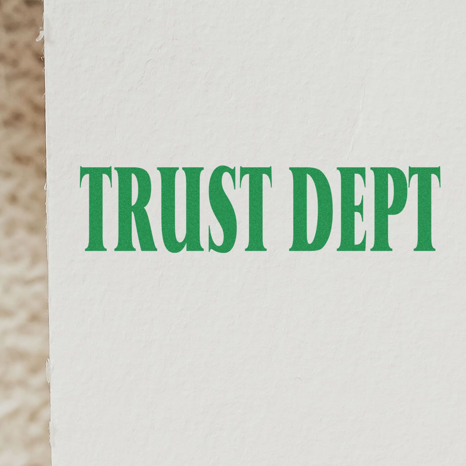 Green TRUST DEPT typography on a white paper background, minimalist branded design.