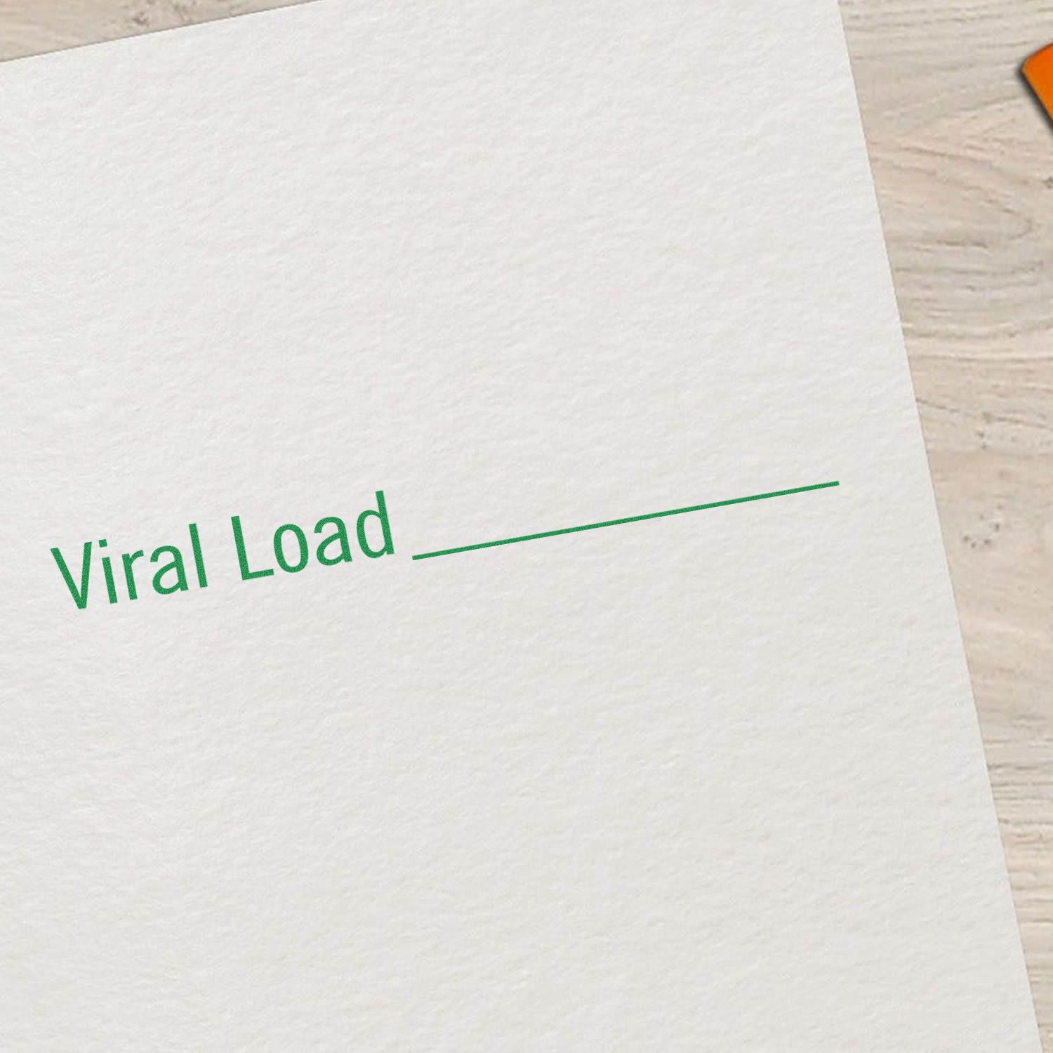 Close-up of a medical form reading Viral Load on a blank paper sheet, healthcare and lab testing concept.