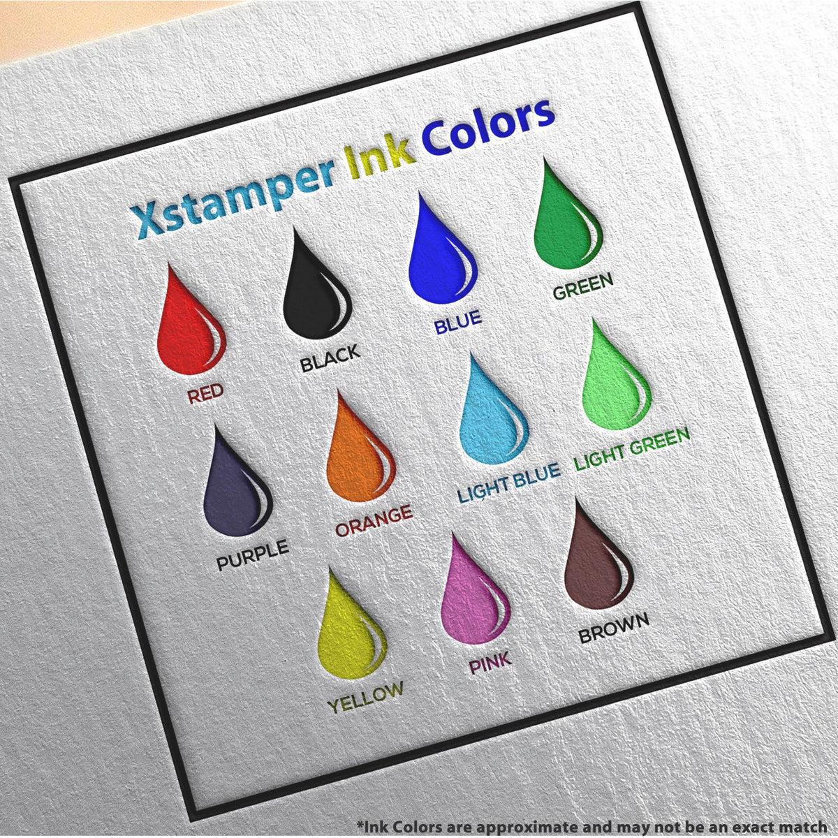 Xstamper stamp ink color chart with labeled options: red, black, blue, green, light blue, light green, orange, purple, pink, yellow, brown.