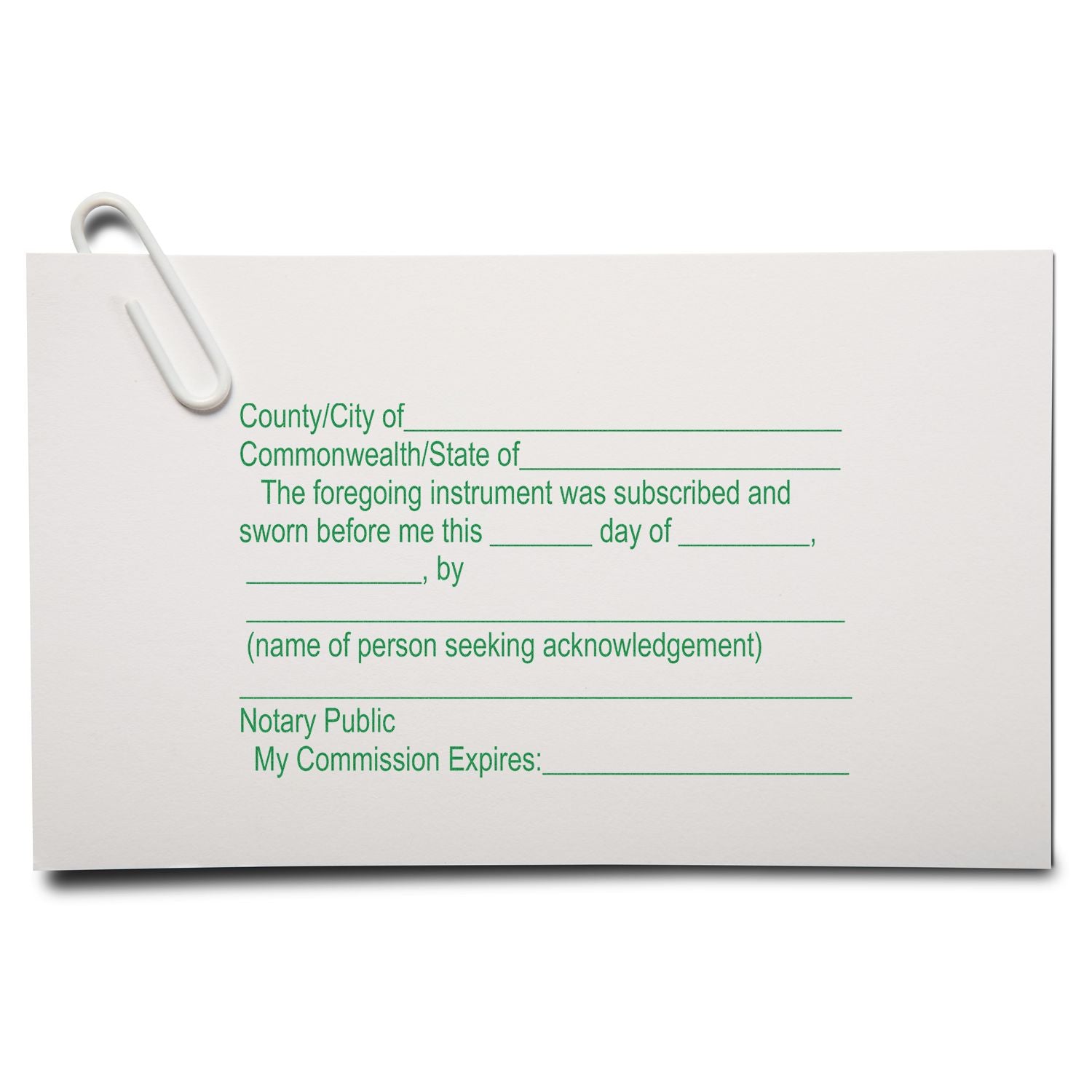 Notary public acknowledgment form on white background with paperclip, legal document template for official signatures and commission expiration.