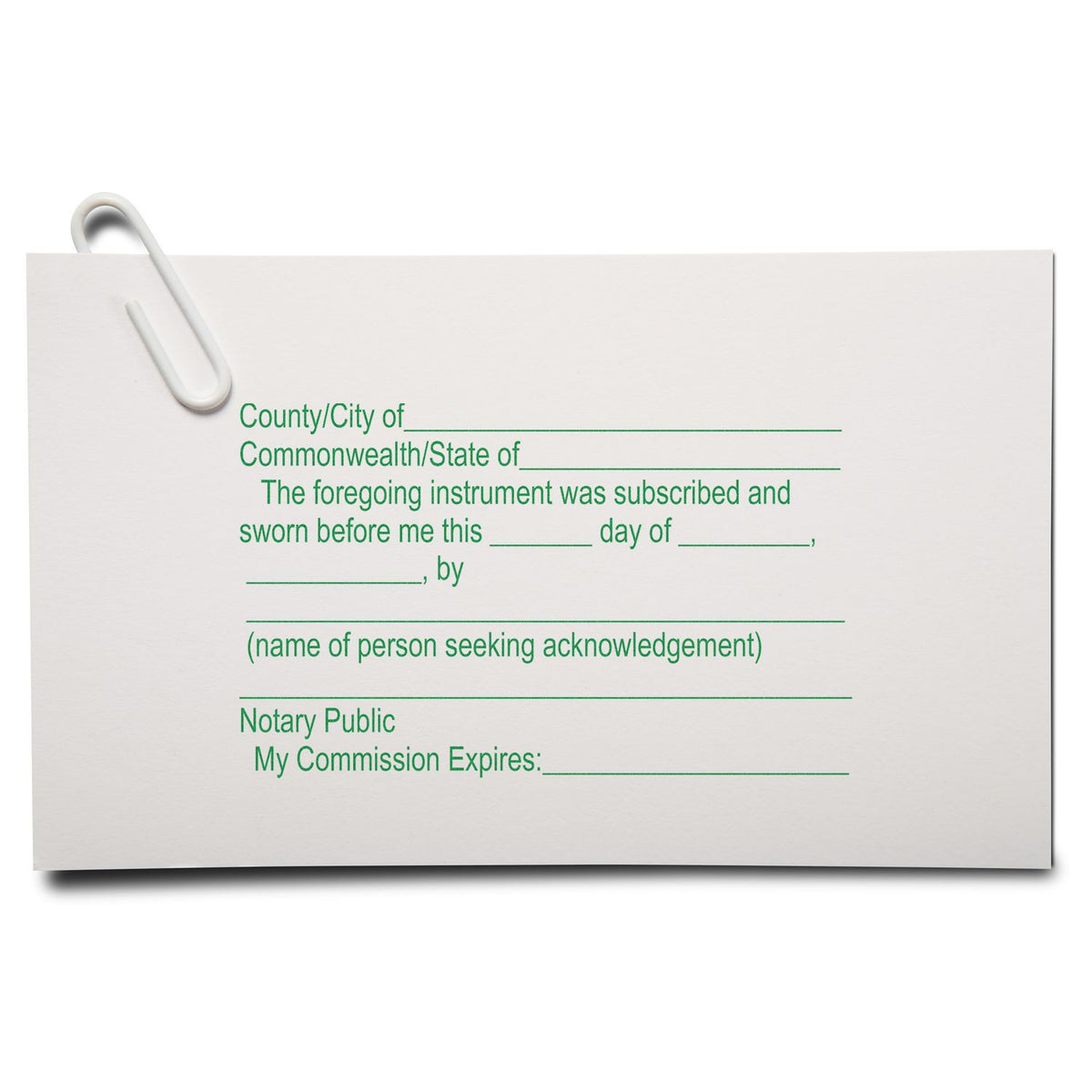 Blank notary public acknowledgment certificate form with paperclip, legal document template for signing and notarization.