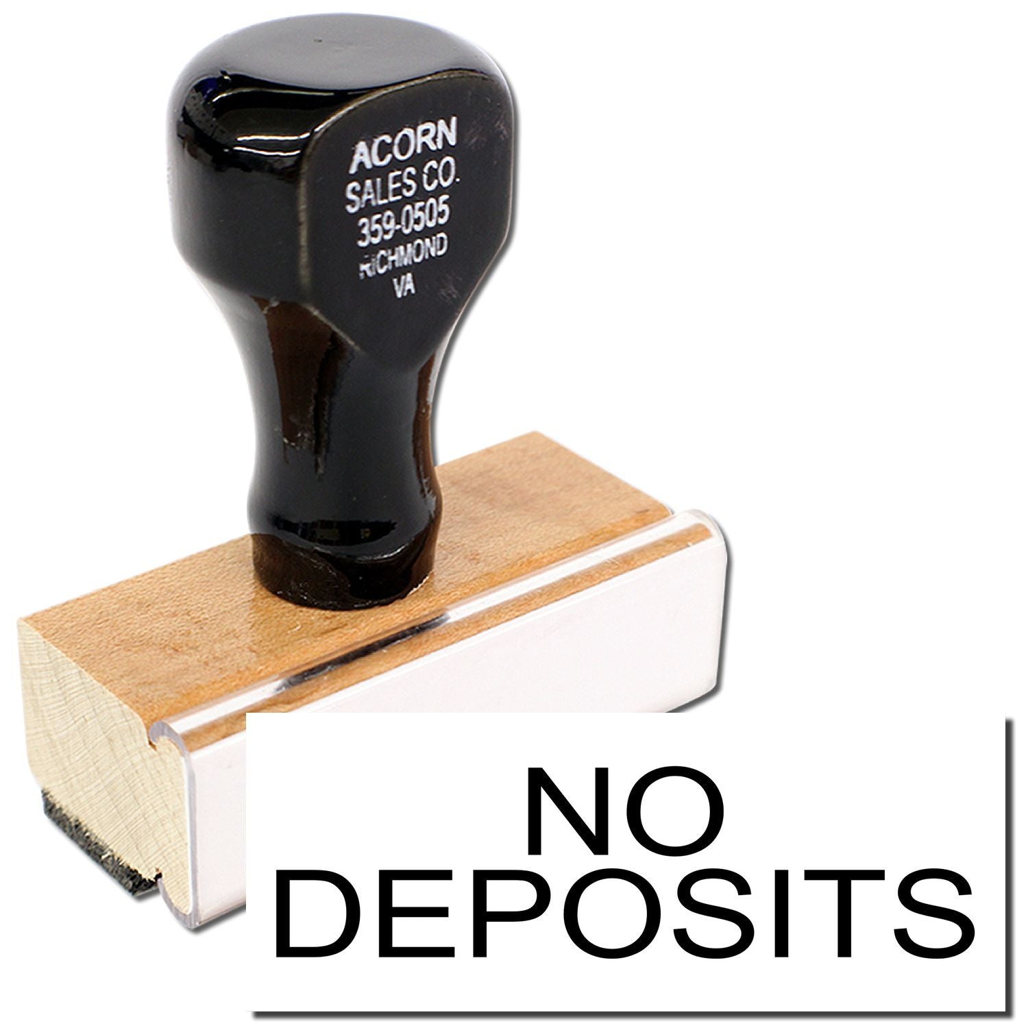 No Deposits promo image showing Acorn Sales Co rubber stamp on a wooden block for property sales.