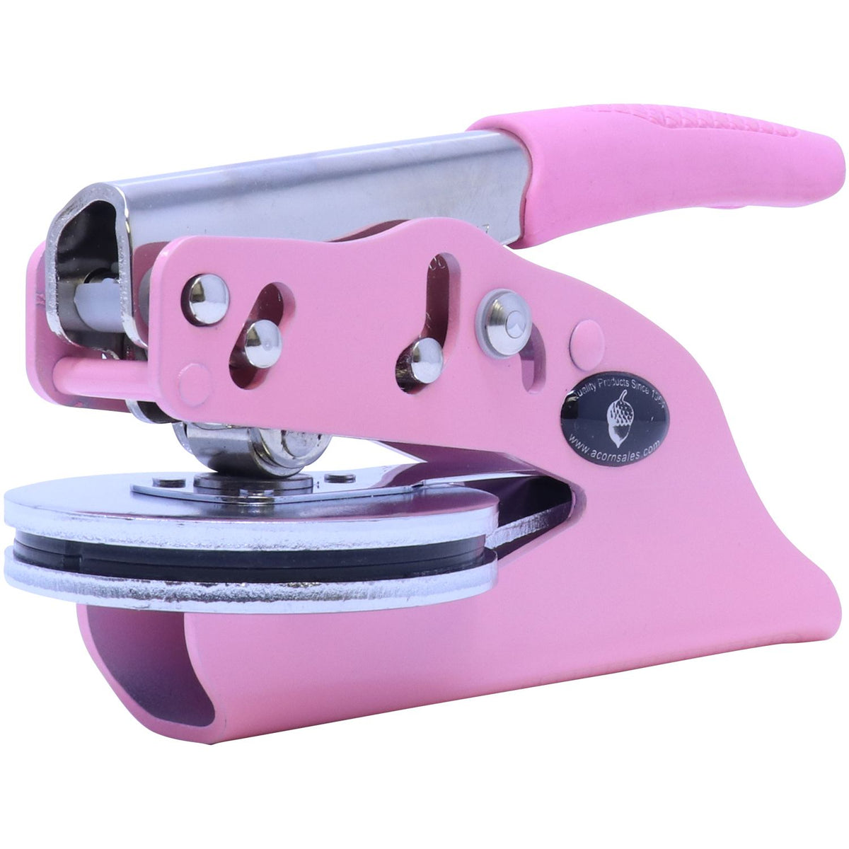 Pink button maker machine with metal lever and circular badge press die on a white background
