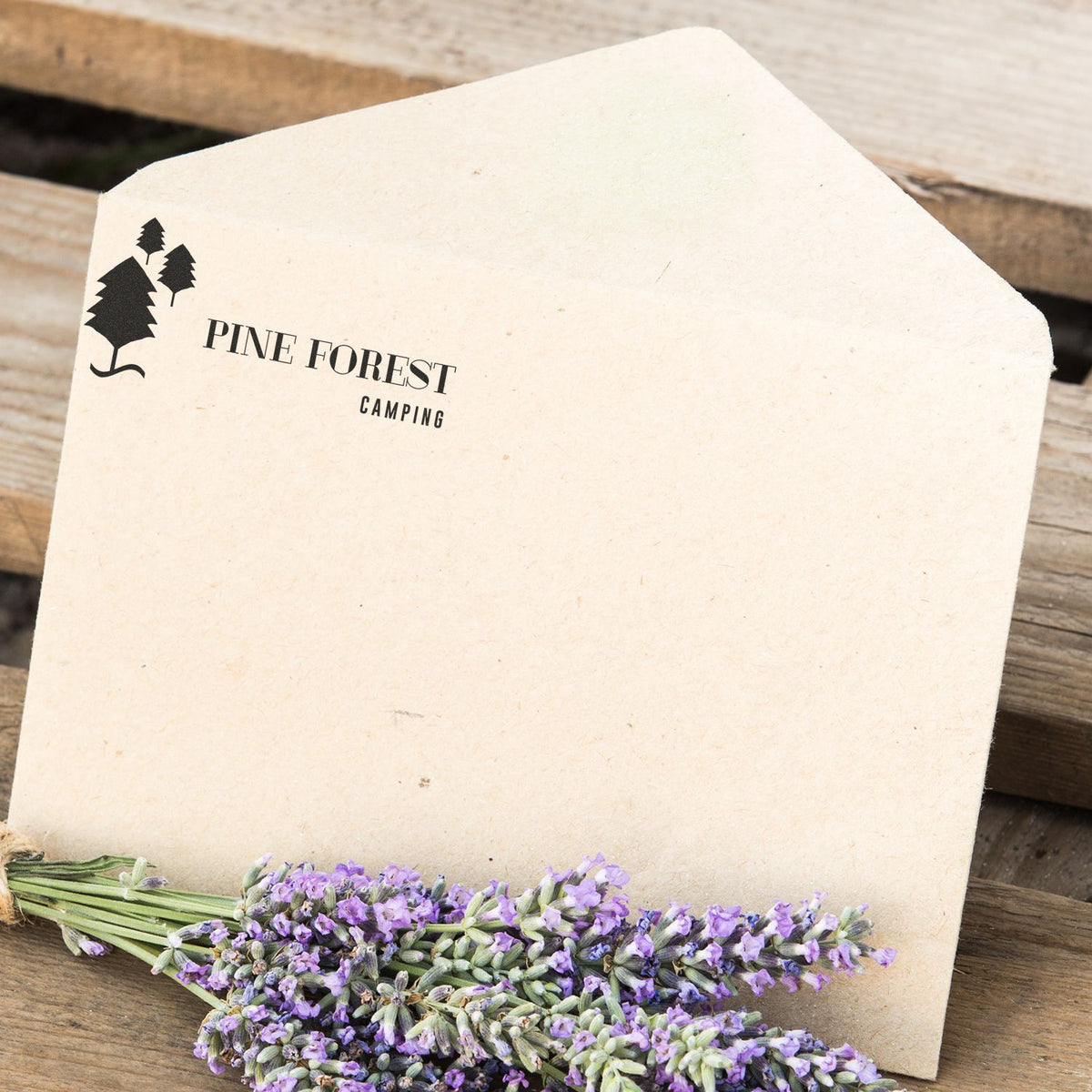 Pine Forest Camping kraft bag with lavender flowers, brand packaging for outdoor camping scents and natural products.