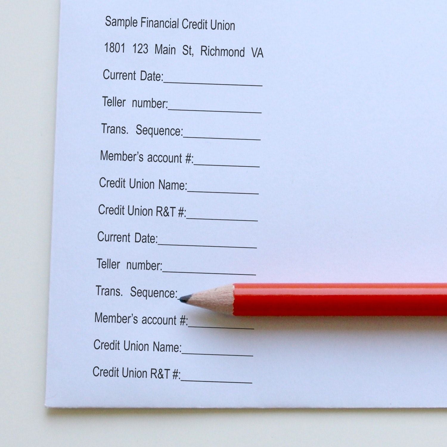 Sample Financial Credit Union deposit slip for Richmond VA with teller number and transaction fields, marked with a red pencil.