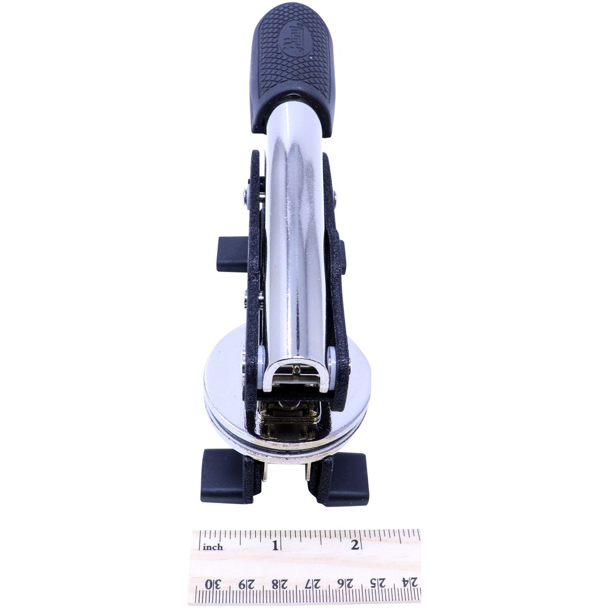 Chrome folding bicycle pedal with rubber grip and size ruler, side view of compact bike pedal hardware.