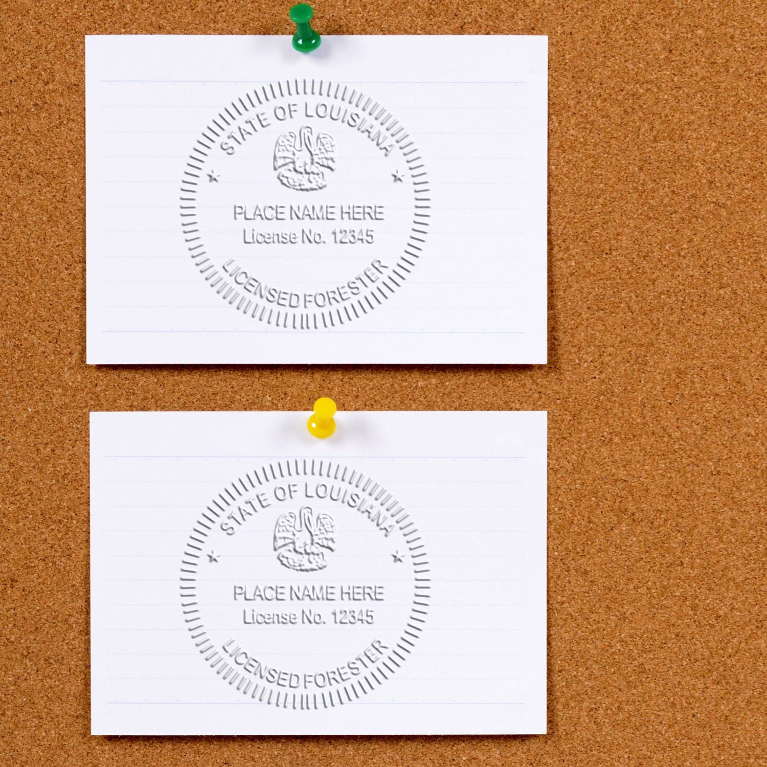 Two Louisiana Licensed Forester documents pinned to a corkboard with green and yellow pushpins.