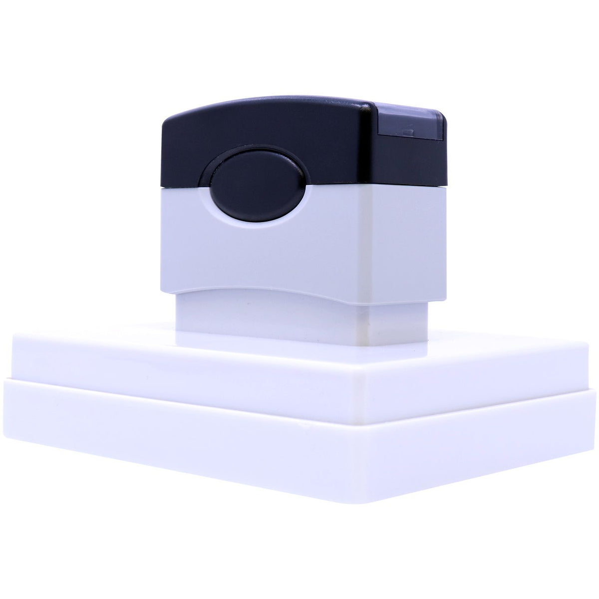 Close-up of a compact plastic device control dial and switch on a white base, isolated product photo for electronics use.