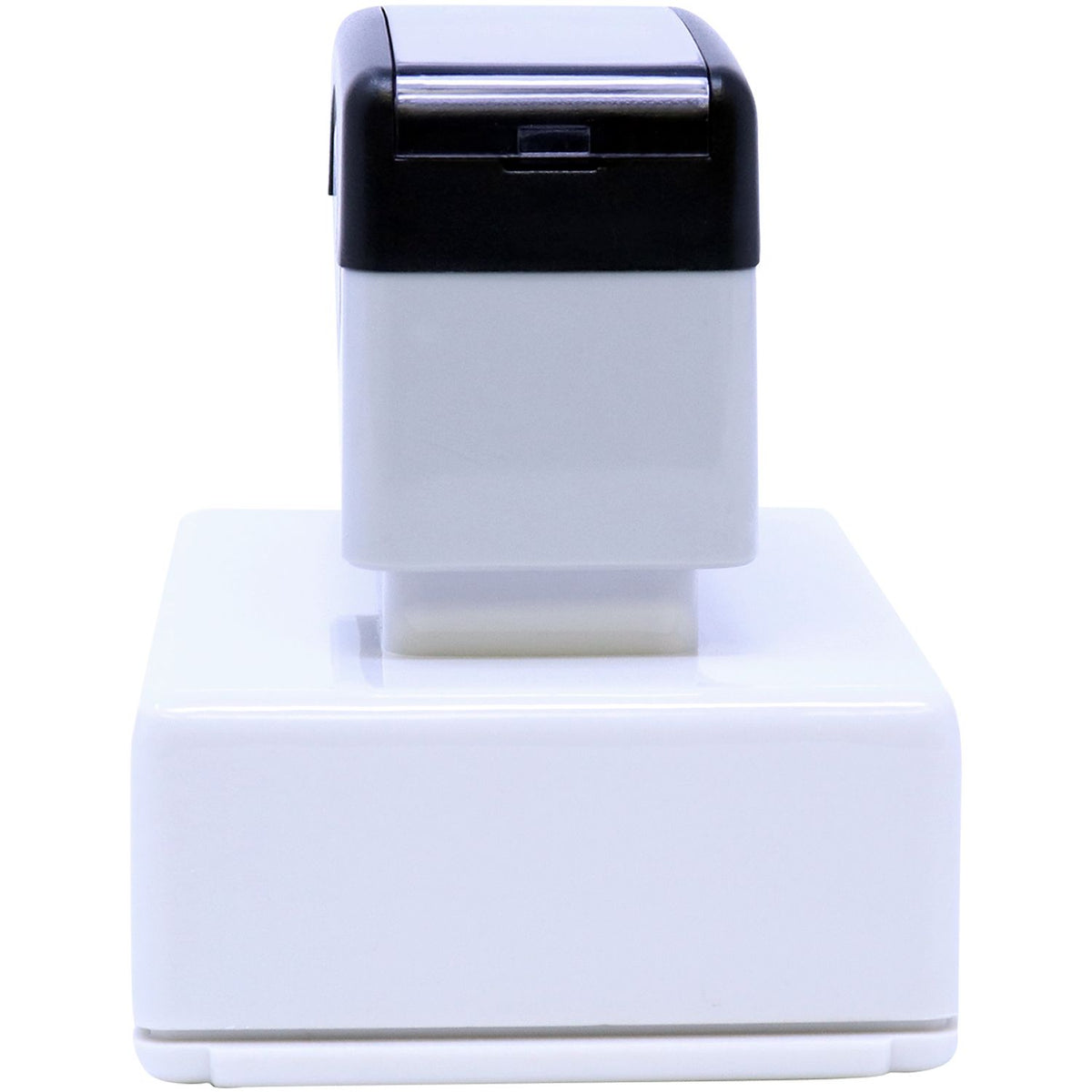 Black and white self-inking office stamp on a white background
