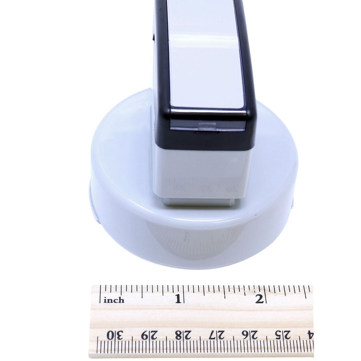 Adjustable smartphone mount with circular base, tape measure showing product size in inches for purchase specs.
