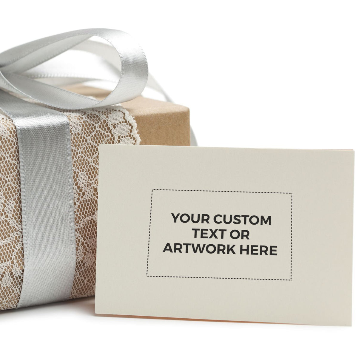 Custom gift bag with satin ribbon and lace texture, showing branded card mockup for personalized text or artwork on white background.
