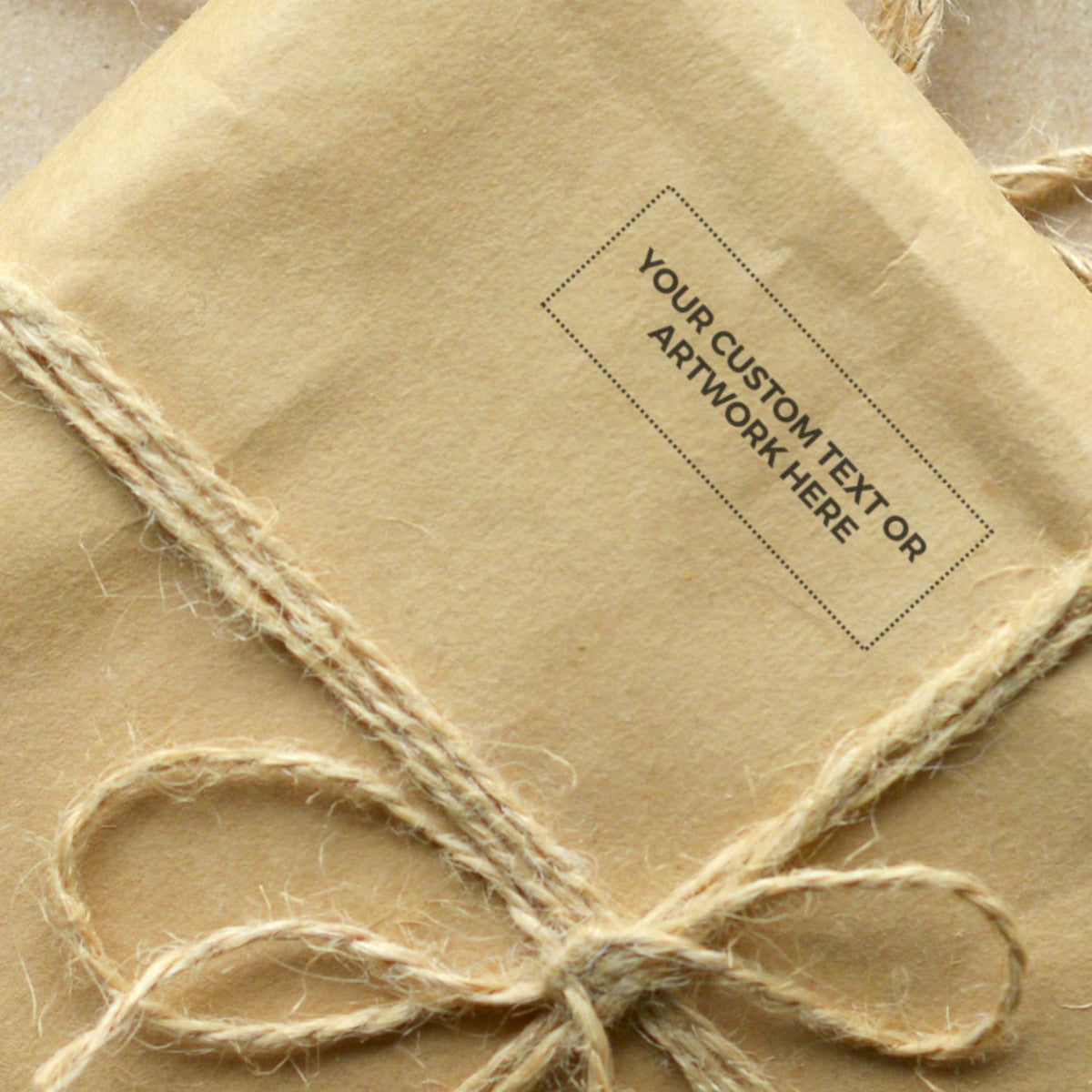 Beige jute twine packaging with Your Custom Artwork Here label for custom brand logo printing.