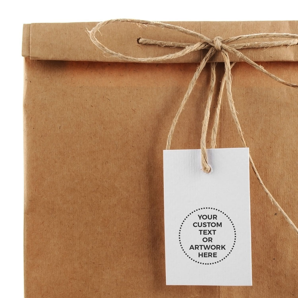 Kraft paper gift bag with twine handle and custom text label tag, ready for branded product packaging and shipping.