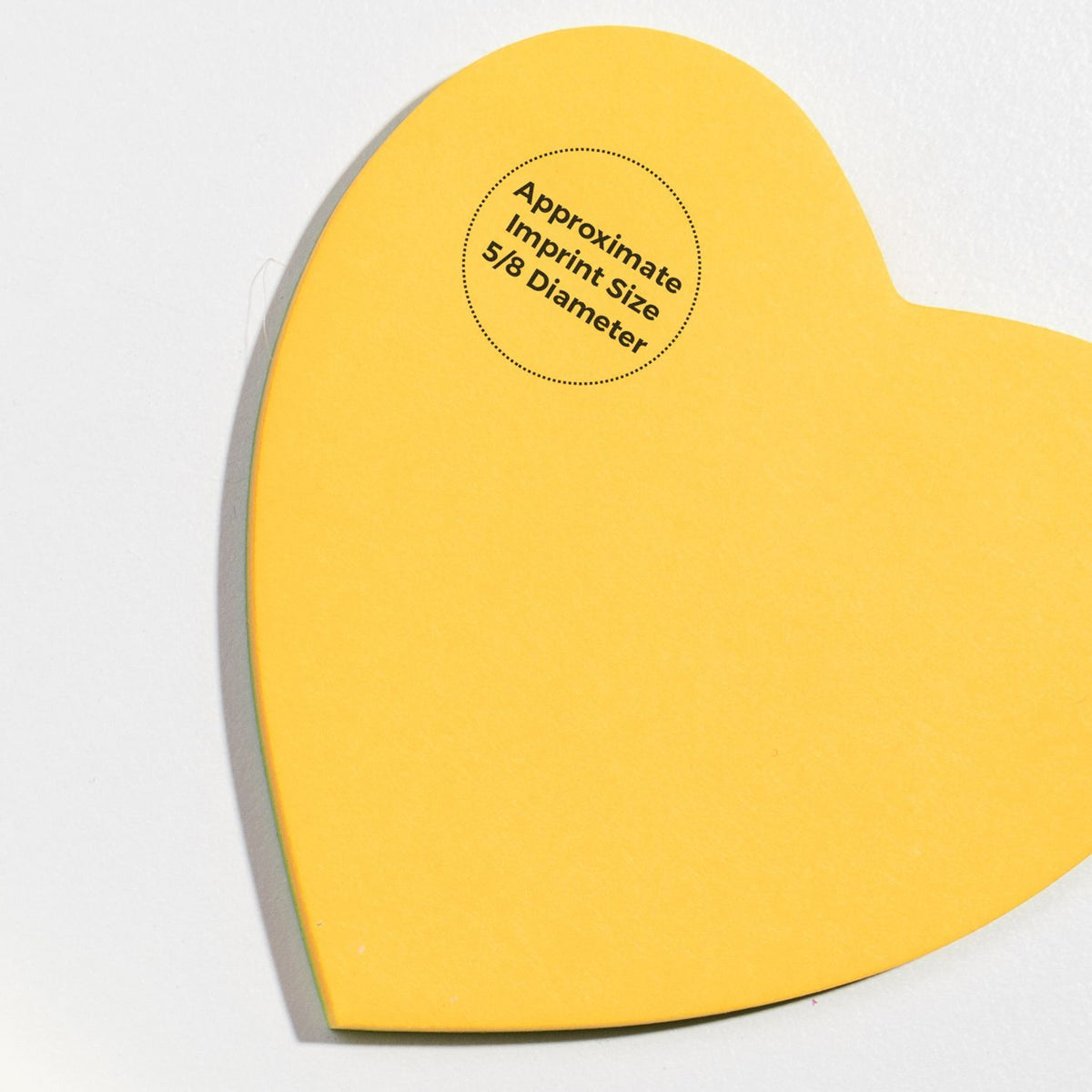 Yellow heart-shaped graphic showing approximate imprint size5/8-inch diameterfor branding placement