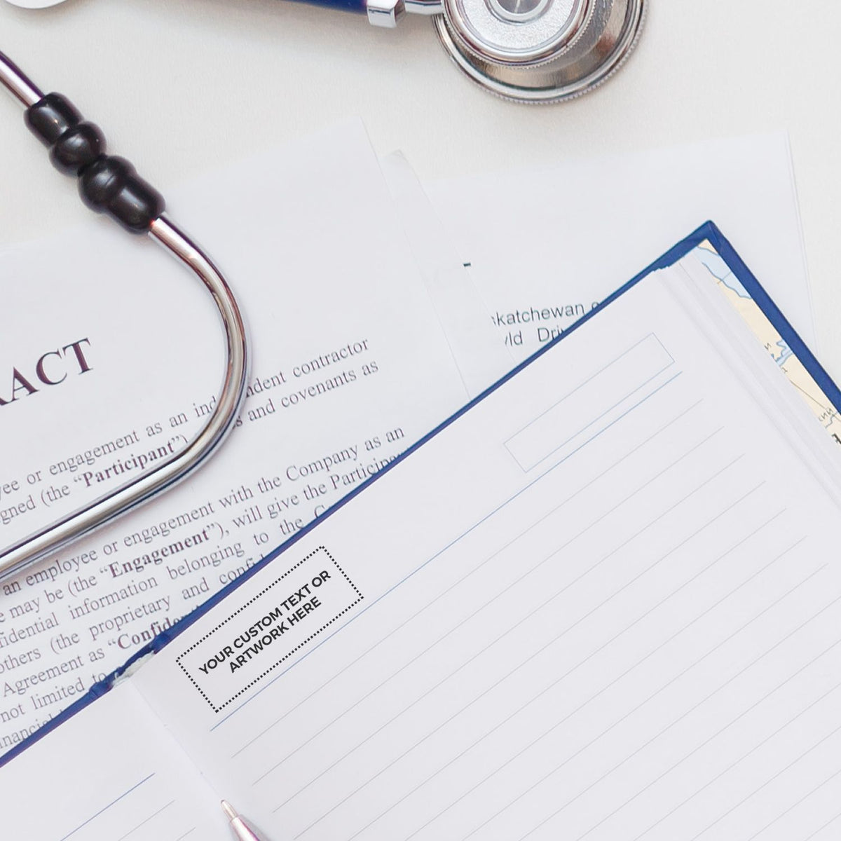 Employment contract agreement with pen and stethoscope on legal document, highlighting review and signature readiness.