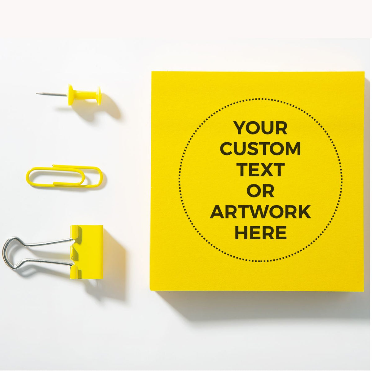 Yellow sticky note pinned with pushpins, acting as a custom text or artwork mockup with creative copy space.