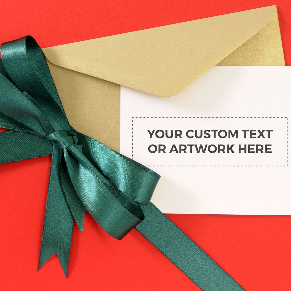 Custom greeting card mockup with envelope and teal satin ribbon, blank text space on a red background.