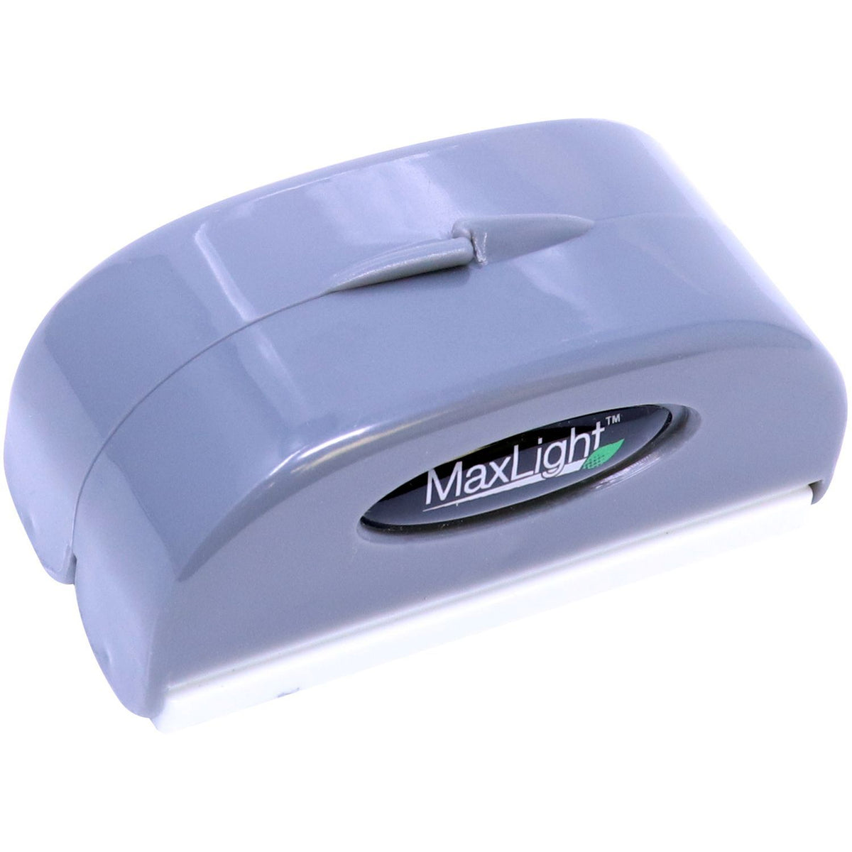 Close-up of MaxLight LED light housing with MaxLight logo and lens, used for vehicle headlight illumination.