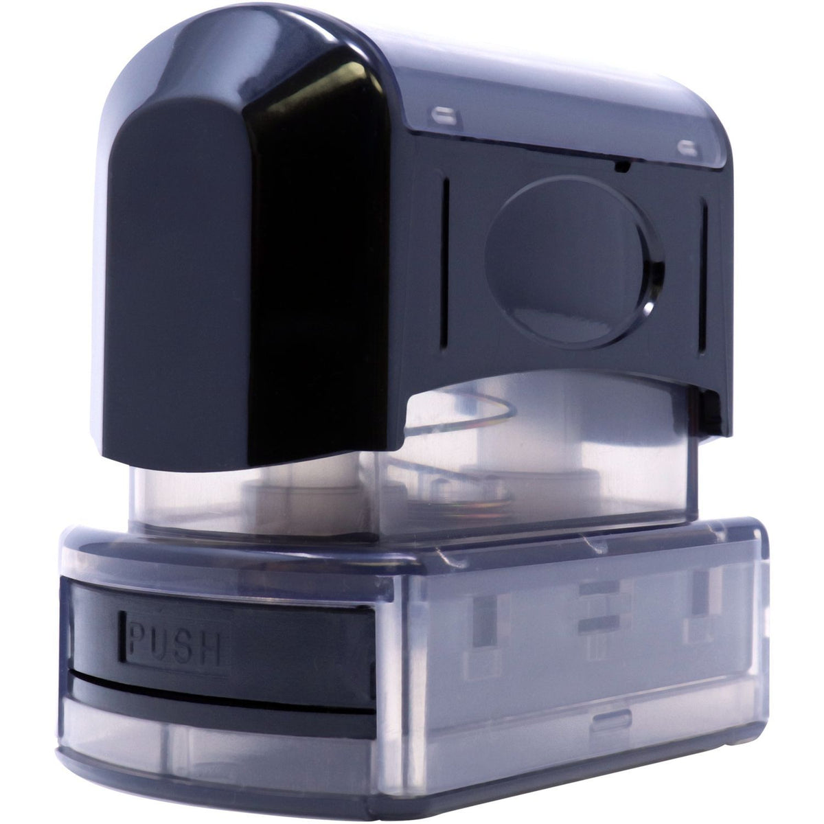 Close-up of transparent PUSH-style soap dispenser with dark pump head, showing refill container and nozzle
