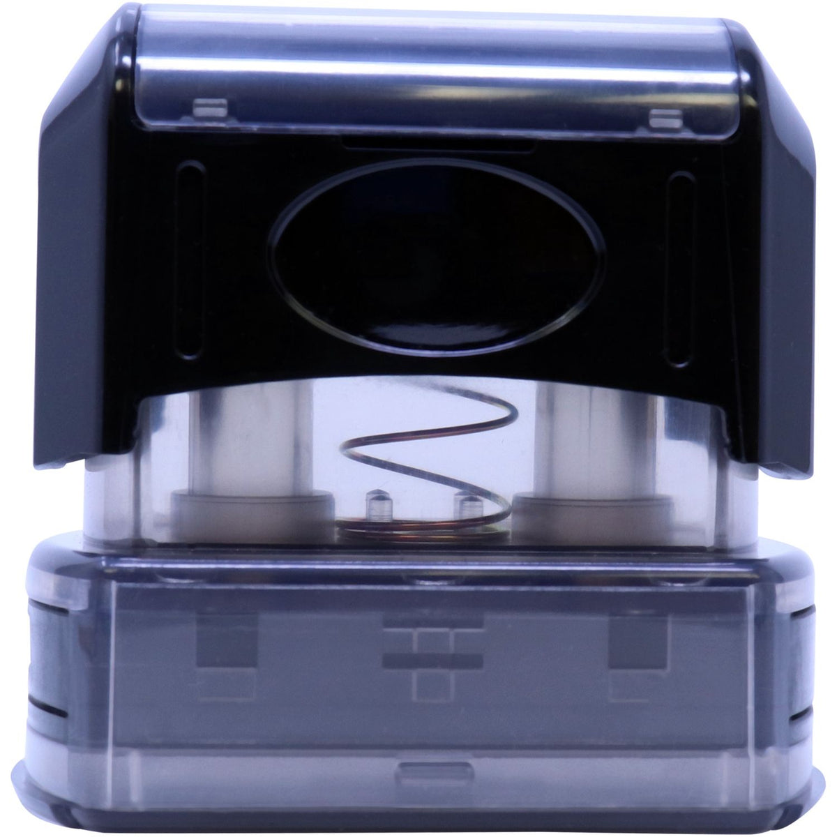 Close-up of electronics connector housing with circular port and internal spring coil, used in wiring and machine assembly.