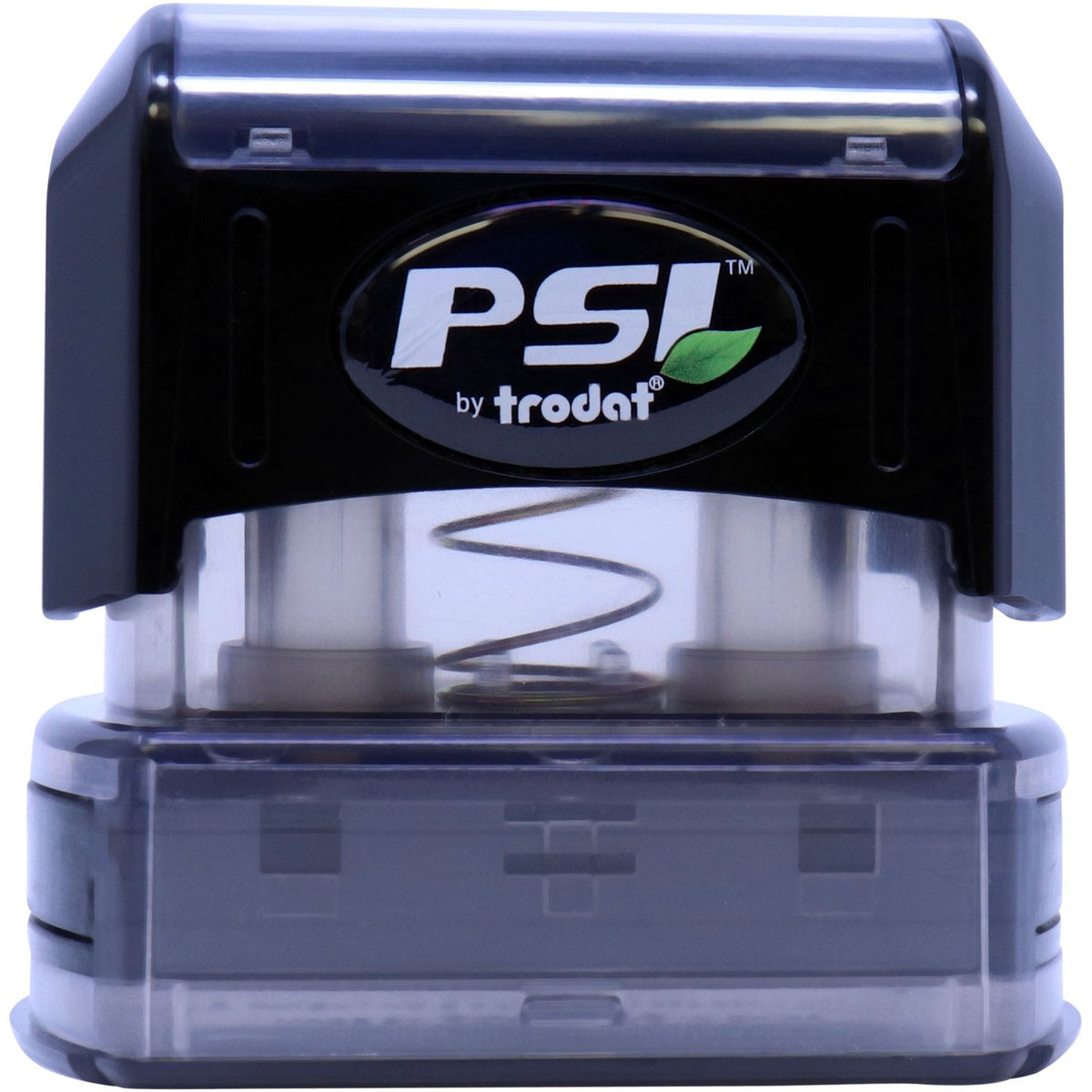 Close-up of PS! by Trodat self-inking stamp, showing logo and print head mechanism on a desktop stamp.
