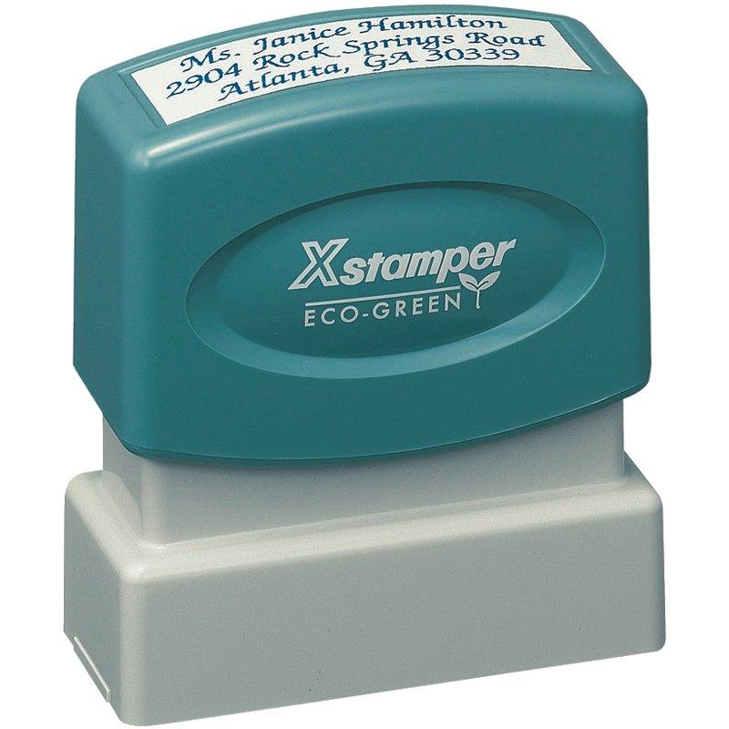 Xstamper Eco-Green self-inking address stamp for mailing, labeled Janice Hamilton, 2904 Ranch Springs Road, Atlanta GA 30339.